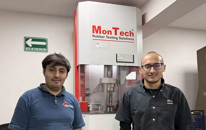 Quality department personnel reviewing data and weighing rubber samples in Everest Group laboratory